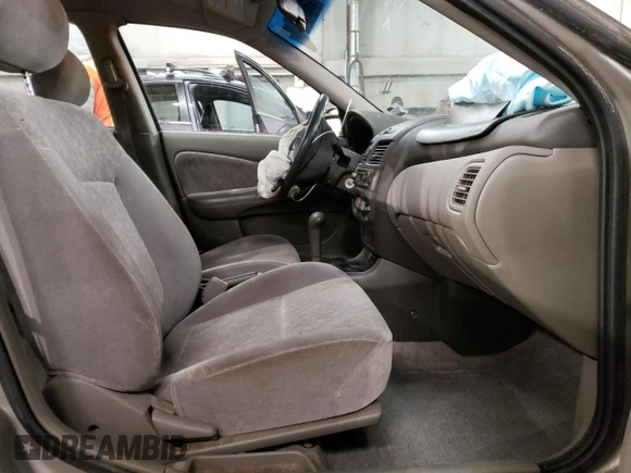 2001 Nissan Sentra GXE with VIN 3N1CB51D51L525519, listed as a Copart auction lot 89087075 with 164,990 mi miles and Salvage title. Bid and sale history available at DreamBid. Image 7.