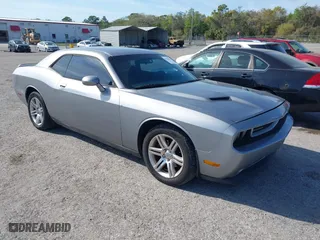 2013 Dodge Challenger Rallye Redline with VIN 2C3CDYAG2DH699956, listed as a IAAI auction lot 41816174 with 163,219 mi miles. Bid and sale history available at carsss.com. Image 1.