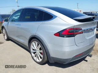 2016 Tesla Model X P90D with VIN 5YJXCAE49GF001067, listed as a IAAI auction lot 41980455 with 94,746 mi miles. Bid and sale history available at carsss.com. Image 3.