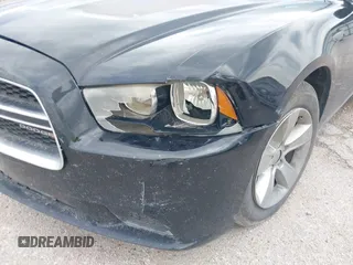 2013 Dodge Charger SE with VIN 2C3CDXBG2DH526480, listed as a IAAI auction lot 42025293 with 147,385 mi miles. Bid and sale history available at carsss.com. Image 12.