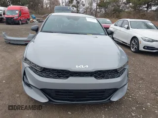 2024 Kia K5 GT-Line z VIN 5XXG64J23RG253362, wystawiony jako IAAI lot #41848600 z przebiegiem 17 481 mil mil oraz . Historia ofert i sprzedaży dostępna na DreamBid. Obrazek 13.