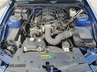 2007 Ford Mustang Deluxe z VIN 1ZVFT80NX75255793, wystawiony jako Copart lot #58993805 z przebiegiem 159 882 mil mil oraz Szkoda całkowita • Salvage title. Historia ofert i sprzedaży dostępna na DreamBid. Obrazek 11.