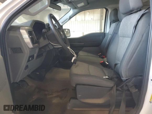 2021 Ford F-150 XL with VIN 1FTMF1EB4MKE11721, listed as a Copart auction lot 65990284 with Not provided miles and Salvage title. Bid and sale history available at DreamBid. Image 7.