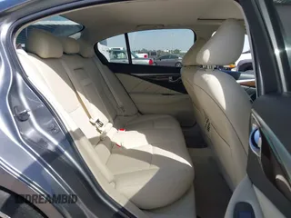 2015 Infiniti Q50 Premium with VIN JN1BV7AP8FM331055, listed as a IAAI auction lot 41828967 with 110,683 mi miles. Bid and sale history available at carsss.com. Image 8.