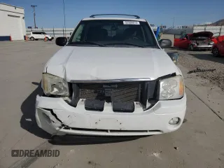 2006 GMC Envoy SLE z VIN 1GKDT13S462156541, wystawiony jako Copart lot #52500615 z przebiegiem 140 558 mil mil oraz Szkody całkowita. Historia ofert i sprzedaży dostępna na DreamBid. Obrazek 5.