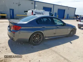 2015 BMW 5 Series 550i with VIN WBAKN9C59FD961491, listed as a Copart auction lot 60208745 with 70,241 mi miles and Salvage title. Bid and sale history available at DreamBid. Image 3.