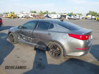 2015 Kia Optima SX Turbo with VIN 5XXGR4A61FG395148, listed as a IAAI auction lot 40313811 with 104,978 mi miles and . Bid and sale history available at DreamBid. Image 3.