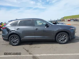 2021 Mazda CX-9 Sport with VIN JM3TCBBY7M0520437, listed as a IAAI auction lot 42022562 with 77,063 mi miles and . Bid and sale history available at DreamBid. Image 13.