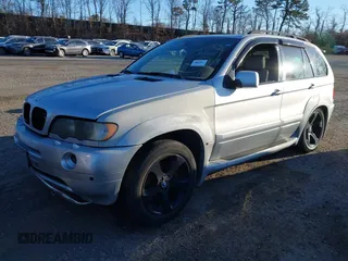 2001 BMW X5 4.4i with VIN WBAFB33511LH07282, listed as a IAAI auction lot 41766599 with 999,999 mi miles. Bid and sale history available at carsss.com. Image 2.