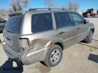 2003 Honda Pilot EX with VIN 2HKYF18563H604120, listed as a IAAI auction lot 41297222 with 248,748 mi miles. Bid and sale history available at carsss.com. Image 4.