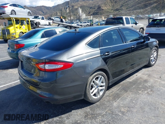 2015 Ford Fusion SE with VIN 3FA6P0H74FR185921, listed as a IAAI auction lot 41745943 with 143,083 mi miles. Bid and sale history available at carsss.com. Image 4.
