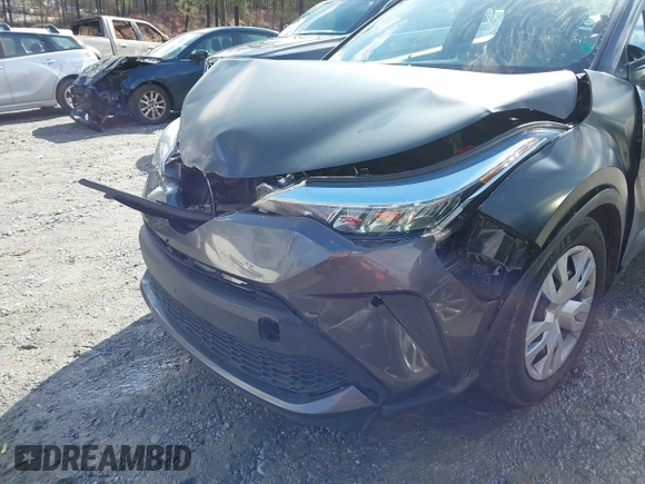 2021 Toyota C-HR LE with VIN NMTKHMBX9MR128998, listed as a IAAI auction lot 41575235 with 96,908 mi miles. Bid and sale history available at carsss.com. Image 6.