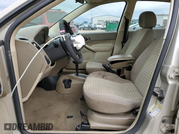 2007 Ford Focus S with VIN 1FAFP34N07W242359, listed as a Copart auction lot 61677025 with 164,445 mi miles and Salvage title. Bid and sale history available at DreamBid. Image 7.