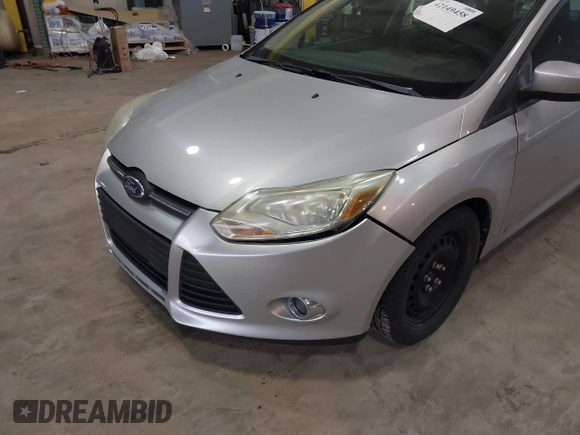 2012 Ford Focus SE with VIN 1FAHP3F26CL207199, listed as a IAAI auction lot 42149458 with 242,158 mi miles. Bid and sale history available at carsss.com. Image 6.