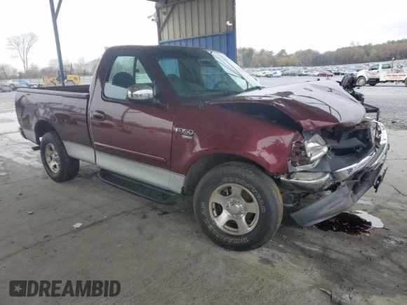 1999 Ford F-150 XL with VIN 2FTRF17L0XCB19827, listed as a Copart auction lot 85282164 with 52,103 mi miles and Salvage title. Bid and sale history available at DreamBid. Image 4.