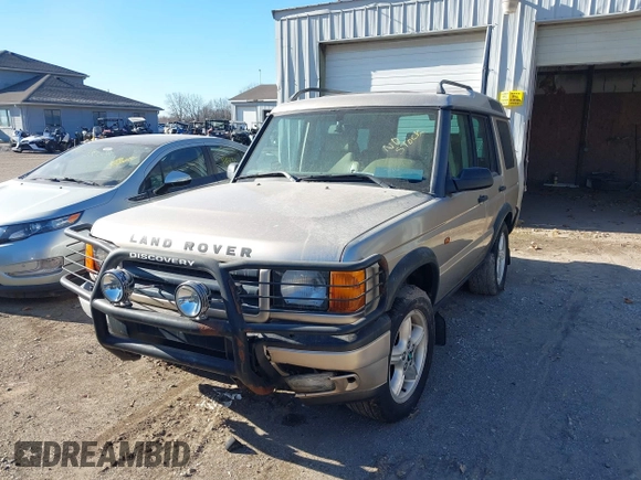 2000 Land Rover Discovery Cloth z VIN SALTY1247YA249969, wystawiony jako IAAI lot #41035905 z przebiegiem 188 643 mil mil oraz . Historia ofert i sprzedaży dostępna na DreamBid. Obrazek 2.