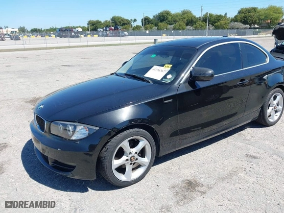2011 BMW 1 Series 128i with VIN WBAUP7C55BVK78344, listed as a IAAI auction lot 41776367 with 138,351 mi miles. Bid and sale history available at carsss.com. Image 2.
