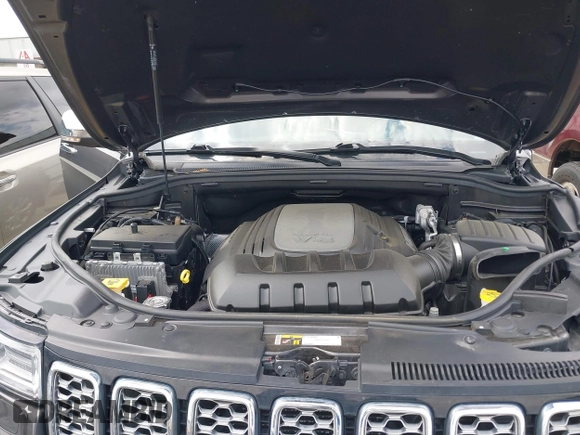 2020 Jeep Grand Cherokee Summit with VIN 1C4RJFJT0LC137054, listed as a IAAI auction lot 42235704 with 70,000 mi miles and . Bid and sale history available at DreamBid. Image 10.
