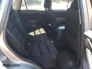2014 Mazda CX-5 Touring with VIN JM3KE4CY9E0415402, listed as a Copart auction lot 56576114 with 181,719 mi miles and Salvage Title. Bid and sale history available at carsss.com. Image 10.