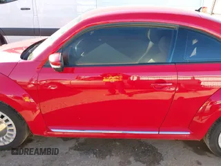 2013 Volkswagen Beetle with VIN 3VWHX7AT3DM682758, listed as a IAAI auction lot 40869170 with 88,793 mi miles and . Bid and sale history available at DreamBid. Image 14.