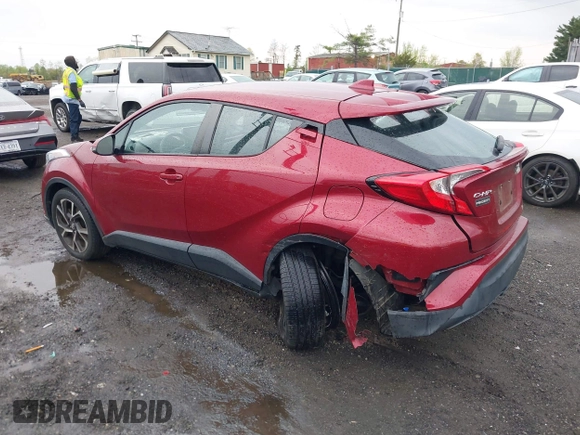 2019 Toyota C-HR XLE with VIN NMTKHMBX0KR088761, listed as a IAAI auction lot 42037328 with 28,501 mi miles and . Bid and sale history available at DreamBid. Image 3.