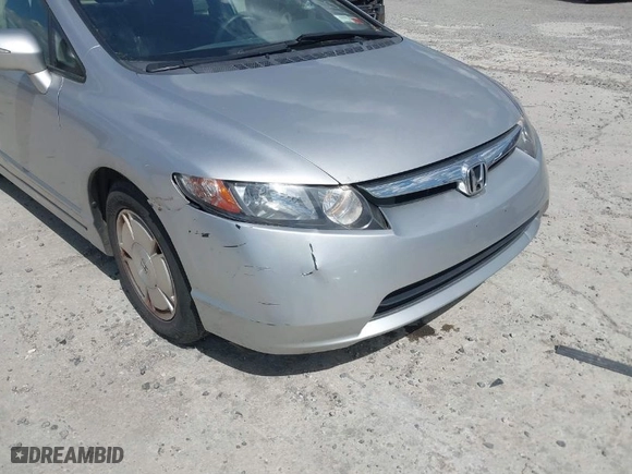 2007 Honda Civic Hybrid with VIN JHMFA36297S019581, listed as a IAAI auction lot 41879187 with 87,297 mi miles. Bid and sale history available at carsss.com. Image 6.