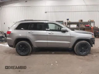 2015 Jeep Grand Cherokee Laredo with VIN 1C4RJFAG4FC797069, listed as a IAAI auction lot 41435299 with 146,755 mi miles. Bid and sale history available at carsss.com. Image 13.