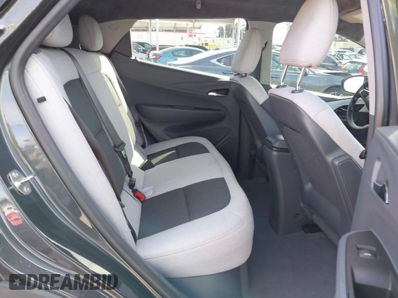 2021 Chevrolet Bolt EV LT z VIN 1G1FY6S03M4112754, wystawiony jako IAAI lot #41615350 z przebiegiem Nie podano mil oraz . Historia ofert i sprzedaży dostępna na DreamBid. Obrazek 8.