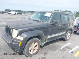 2011 Jeep Liberty Sport with VIN 1J4PP2GK8BW580217, listed as a IAAI auction lot 42046477 with 240,189 mi miles. Bid and sale history available at carsss.com. Image 2.