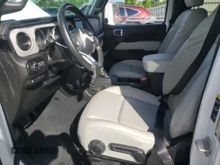 2022 Jeep Wrangler Unlimited Sahara z VIN 1C4JJXP60NW172103, wystawiony jako Copart lot #60396415 z przebiegiem 29 960 mil mil oraz Szkoda całkowita • Salvage title. Historia ofert i sprzedaży dostępna na DreamBid. Obrazek 7.