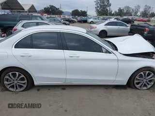 2016 Mercedes-Benz C 300 with VIN 55SWF4JB0GU124439, listed as a IAAI auction lot 40302446 with 71,304 mi miles and . Bid and sale history available at carsss.com. Image 14.