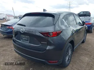 2020 Mazda CX-5 Touring with VIN JM3KFBCM1L0792396, listed as a IAAI auction lot 41949124 with 118,280 mi miles. Bid and sale history available at carsss.com. Image 4.