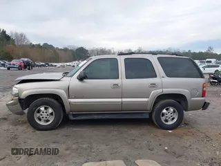 2002 Chevrolet Tahoe LT with VIN 1GNEC13Z22J256805, listed as a IAAI auction lot 41302460 with 249,578 mi miles and . Bid and sale history available at DreamBid. Image 14.