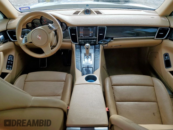2014 Porsche Panamera с VIN WP0AA2A79EL009620, выставлен на аукционе Copart как лот 58654975 с пробегом 169 322 миль миль и Списание • Salvage title. История ставок и продаж доступна на DreamBid. Изображение 8.