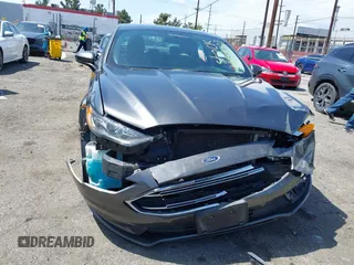 2017 Ford Fusion S with VIN 3FA6P0G73HR343623, listed as a IAAI auction lot 41957903 with 100,544 mi miles. Bid and sale history available at carsss.com. Image 6.