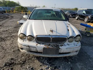2005 Jaguar X-Type z VIN SAJWB52D55XE26531, wystawiony jako Copart lot #50909445 z przebiegiem 158 861 mil mil oraz Szkoda całkowita • Salvage title. Historia ofert i sprzedaży dostępna na DreamBid. Obrazek 5.