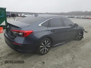 2023 Honda Civic EX z VIN 2HGFE1F70PH306337, wystawiony jako Copart lot #46122695 z przebiegiem 48 200 mil mil oraz Szkoda całkowita • Salvage title. Historia ofert i sprzedaży dostępna na DreamBid. Obrazek 3.