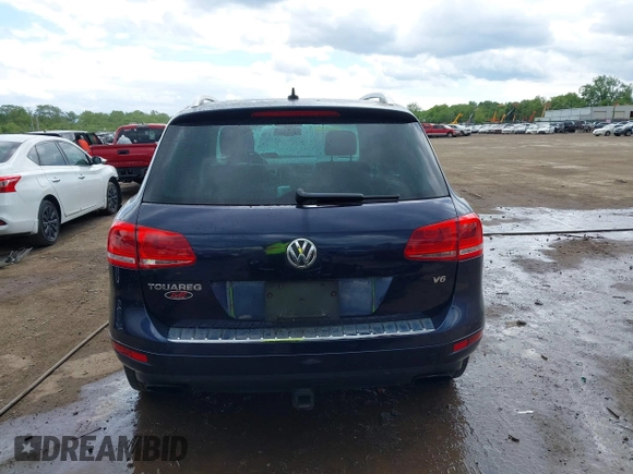 2011 Volkswagen Touareg Sport z VIN WVGFF9BP0BD002958, wystawiony jako IAAI lot #42281009 z przebiegiem 147 801 mil mil oraz . Historia ofert i sprzedaży dostępna na DreamBid. Obrazek 17.