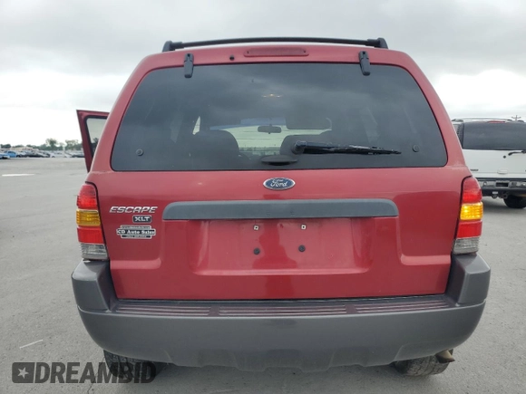 2004 Ford Escape XLT z VIN 1FMYU03104KB51972, wystawiony jako Copart lot #62119665 z przebiegiem 121 785 mil mil oraz Szkoda całkowita • Salvage title. Historia ofert i sprzedaży dostępna na DreamBid. Obrazek 6.