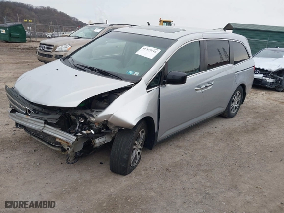 2011 Honda Odyssey EX-L with VIN 5FNRL5H61BB004096, listed as a IAAI auction lot 41917946 with 142,005 mi miles. Bid and sale history available at carsss.com. Image 2.