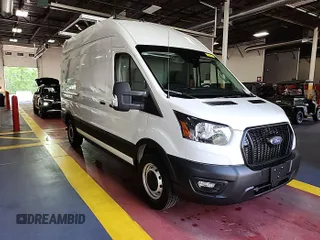 2023 Ford Transit Cargo z VIN 1FTBR1X85PKC00581, wystawiony jako IAAI lot #42900680 z przebiegiem 8 386 mil mil oraz . Historia ofert i sprzedaży dostępna na DreamBid. Obrazek 8.