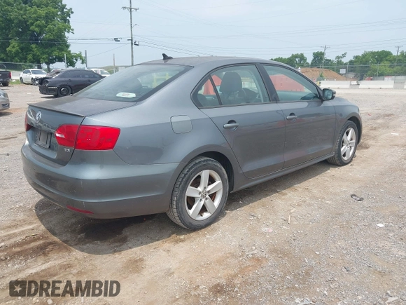 2012 Volkswagen Jetta TDI w/Premium & Nav with VIN 3VWLL7AJ7CM120526, listed as a IAAI auction lot 42494136 with 149,202 mi miles and . Bid and sale history available at DreamBid. Image 4.