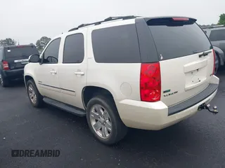 2011 GMC Yukon SLT z VIN 1GKS2CE03BR101906, wystawiony jako IAAI lot #42363728 z przebiegiem 105 326 mil mil oraz . Historia ofert i sprzedaży dostępna na DreamBid. Obrazek 3.