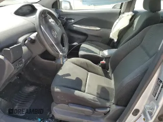 2009 Toyota Yaris with VIN JTDBT903391300394, listed as a Copart auction lot 53392945 with 227,210 mi miles and Salvage Title. Bid and sale history available at DreamBid. Image 7.