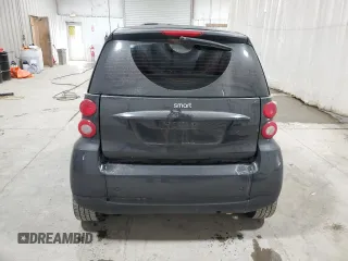 2011 Smart fortwo Pure с VIN WMEEJ3BA5BK480412, выставлен на аукционе Copart как лот 87023194 с пробегом 70 496 миль миль и Списание • Salvage title. История ставок и продаж доступна на DreamBid. Изображение 6.