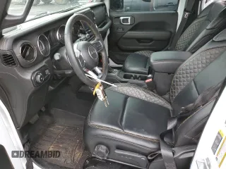 2023 Jeep Wrangler Sahara z VIN 1C4HJXEG9PW544275, wystawiony jako Copart lot #59932585 z przebiegiem 21 382 mil mil oraz Szkoda całkowita • Salvage title. Historia ofert i sprzedaży dostępna na DreamBid. Obrazek 7.