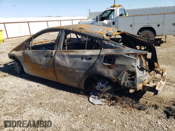 2021 Toyota Prius LE with VIN JTDKAMFP3M3173159, listed as a Copart auction lot 86616494 with Not provided miles and Salvage title. Bid and sale history available at DreamBid. Image 2.