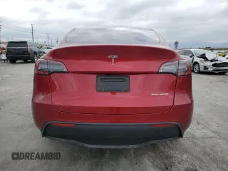 2024 Tesla Model Y Long Range с VIN 7SAYGDEE5RA251895, выставлен на аукционе Copart как лот 50180245 с пробегом 14 199 миль миль и Списание • Salvage title. История ставок и продаж доступна на DreamBid. Изображение 6.