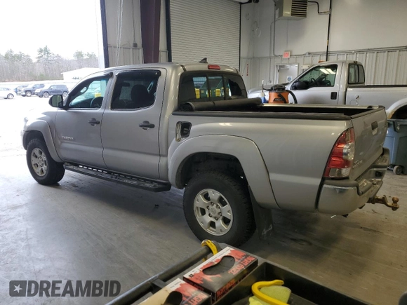 2015 Toyota Tacoma with VIN 3TMLU4EN7FM170049, listed as a Copart auction lot 52083725 with 162,062 mi miles and Salvage Title. Bid and sale history available at DreamBid. Image 2.