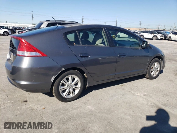2010 Honda Insight EX with VIN JHMZE2H73AS039935, listed as a Copart auction lot 46192575 with 127,329 mi miles and Salvage Title. Bid and sale history available at DreamBid. Image 3.